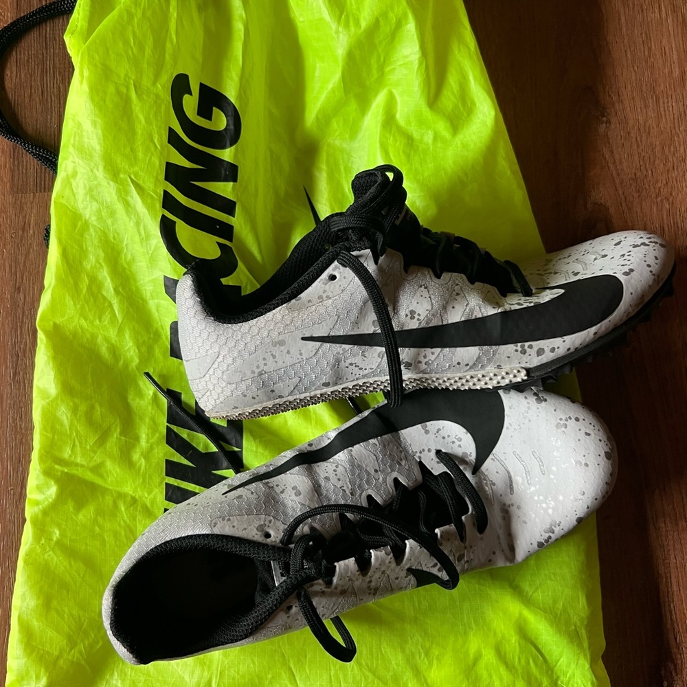 Nike track shoes- worn once. US size 5.5. Like new.